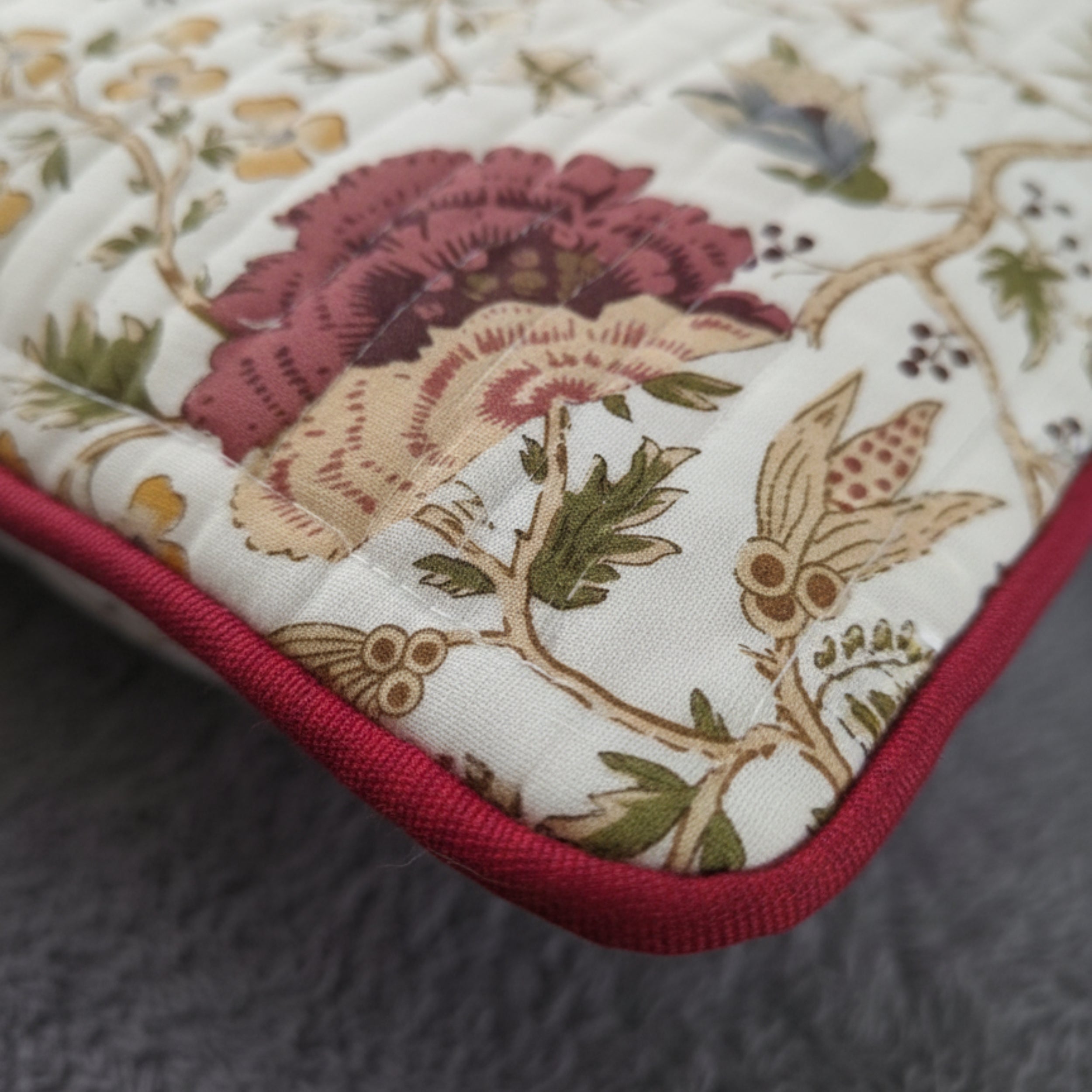 QUILTED FLORAL CUSHION COVER