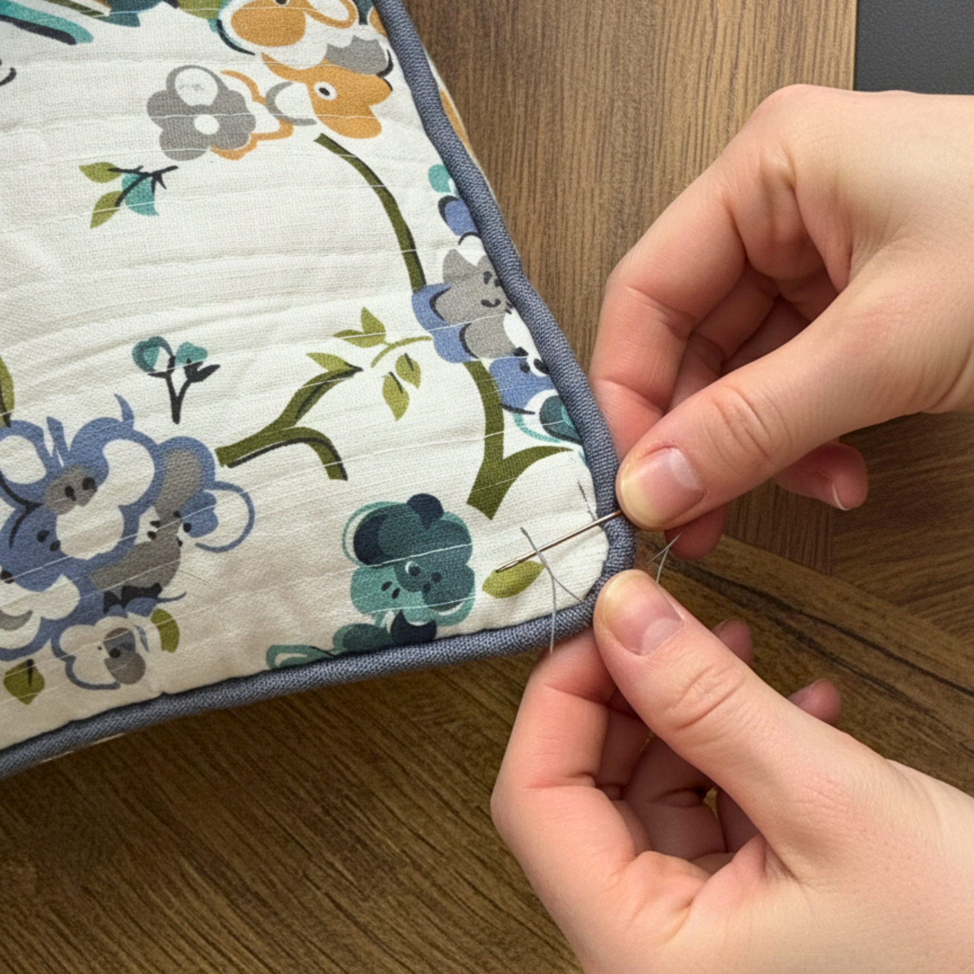 QUILTED FLORAL CUSHION COVER
