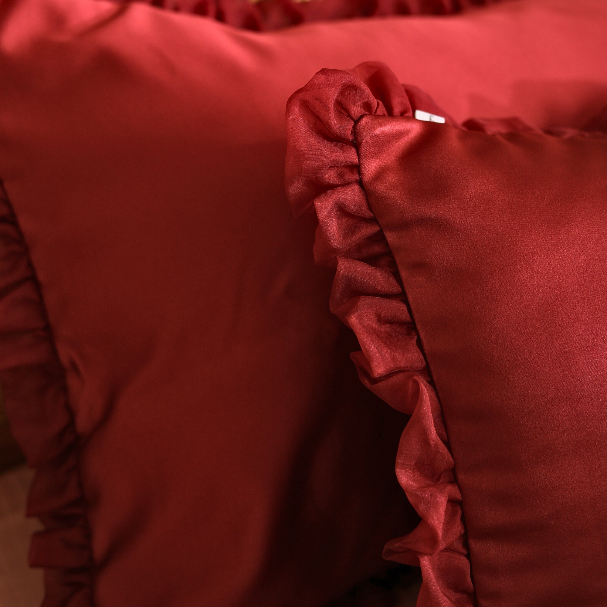 Elegant Maroon Satin Pillow Covers with Ruffled Edges